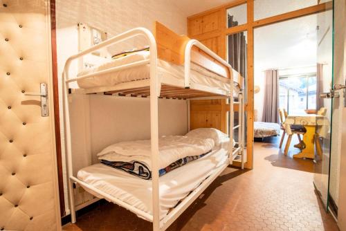 Poschodová posteľ alebo postele v izbe v ubytovaní Résidence Le Pra - 2 Pièces pour 6 Personnes 193118