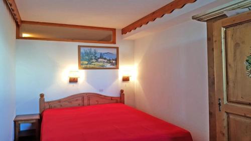 מיטה או מיטות בחדר ב-Résidence Parc Aux Etoiles - Appartements pour 6 Personnes 704