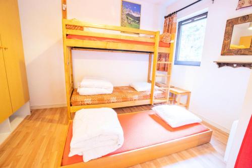 Katil atau katil-katil dalam bilik di Résidence Les Avenieres - LES AROLLES - AV31E MAE-3166
