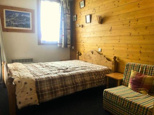 Ένα ή περισσότερα κρεβάτια σε δωμάτιο στο Résidence Portail - Le Portail 64 - 3 pièces au pied des pistes, classé 3 étoiles MAE-5024