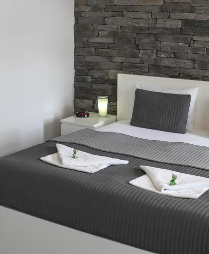 Rozmaryn Hotel B&Bにあるベッド
