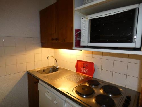 A cozinha ou cozinha compacta de Résidence LAUZIERE DESSUS - 3 Pièces pour 8 Personnes 34