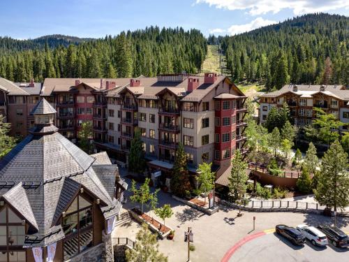 an aerial view of a resort with cars parked in a parking lot at Northstar California Resort in Truckee