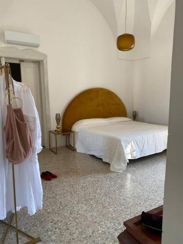 Postel nebo postele na pokoji v ubytování Palazzo Giustiniani L'Ambasciatore