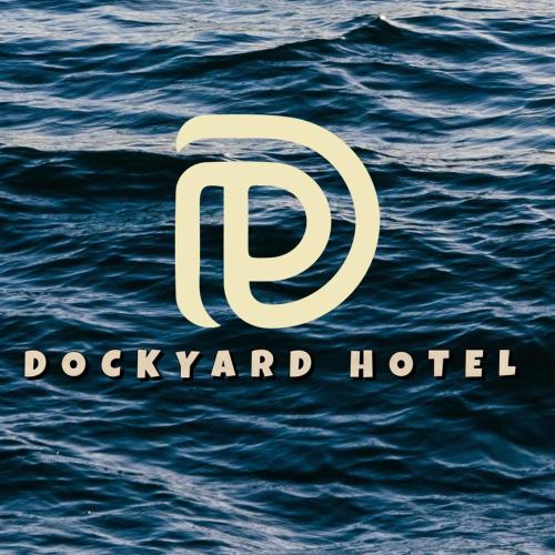 a logo for a dodgyard hotel on the water at DOCKYARD HOTEL in Trincomalee