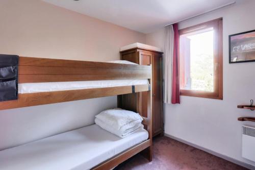Poschodová posteľ alebo postele v izbe v ubytovaní Résidence L'Albane - maeva Home - Appartement 2 pièces 5 personnes - Prest 064