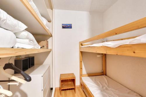Résidences Les Fibières - maeva Home - Appartement 2 pièces 4 personnes - 504 tesisinde bir ranza yatağı veya ranza yatakları