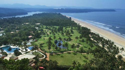 an aerial view of a resort and the beach at The St. Regis Goa Resort in Cavelossim