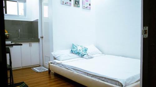 Ein Bett oder Betten in einem Zimmer der Unterkunft Luna Prime Hub And Inn