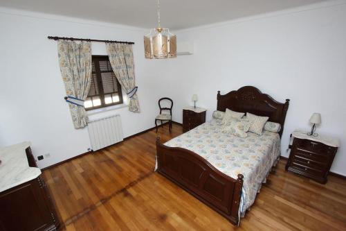 Un pat sau paturi într-o cameră la Casa Dávó