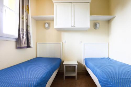 Posteľ alebo postele v izbe v ubytovaní Résidence le Hameau des Issambres - maeva Home - 2 Pièces 4 Personnes Sélection MAE-1328