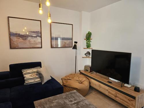 TV a/nebo společenská místnost v ubytování Casa Masaly vistas al mar