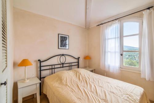 Postel nebo postele na pokoji v ubytování Les Bastides aux Restanques du Golfe de St Tropez - Maeva Home - Bastide avec 69