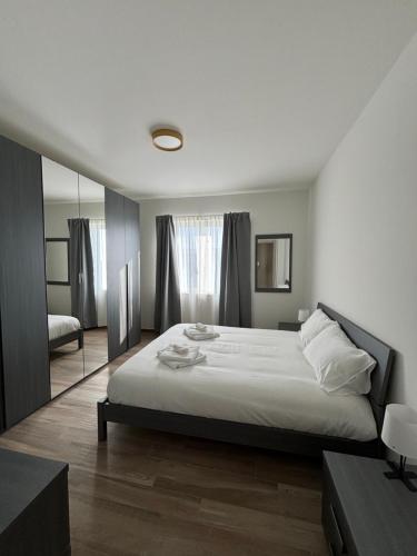 En eller flere senge i et værelse på Bernardoni