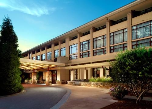 a large office building with a lot of windows at Emory Conference Center Hotel in Atlanta