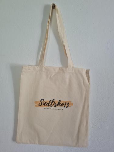 a tote bag with the words social brothers on it at Siedlisko13 in Mrągowo
