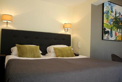 Una cama o camas en una habitación de Margis Hotel & SPA