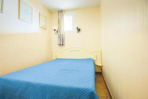Postel nebo postele na pokoji v ubytování Les Appartements aux Restanques du Golfe de St Tropez - maeva Home - Appartem 07