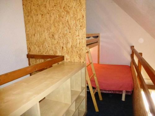 a room with a desk and a chair in it at Résidence Neouvielle - Studio duplex avec place de parking dans le centre de Barèges MAE-8714 in Barèges