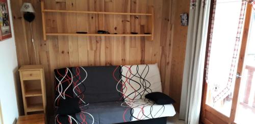 En eller flere senger på et rom på Résidence La Croix Du Sud - Studio pour 4 Personnes 24