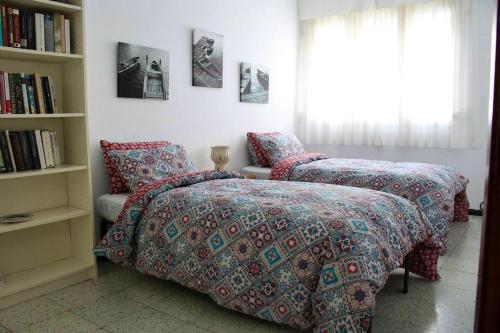 Ένα ή περισσότερα κρεβάτια σε δωμάτιο στο Spacious house in Telde with modern comfort