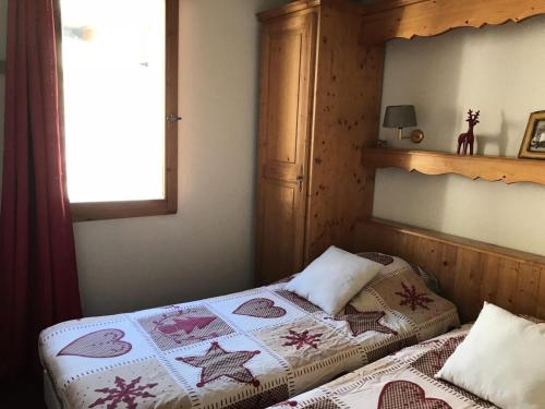 Postel nebo postele na pokoji v ubytování Chalets Du Galibier I - 2 Pièces pour 4 Personnes 74