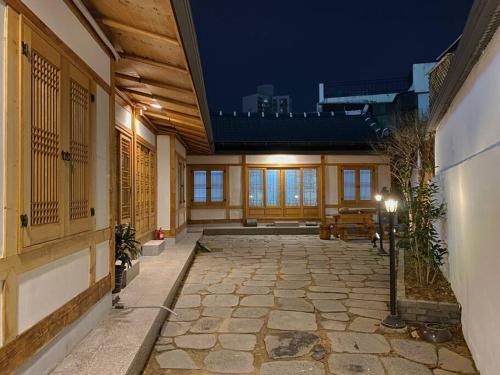 an empty hallway of a building at night at Hanok guesthouse Ann 