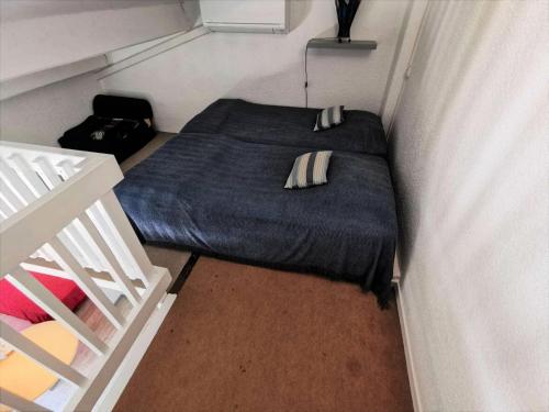 Postel nebo postele na pokoji v ubytování Résidence Les Maisons Du Port - VILLA T2 MEZZANINE 6 couchages PORT LEUCATE MAE-5474