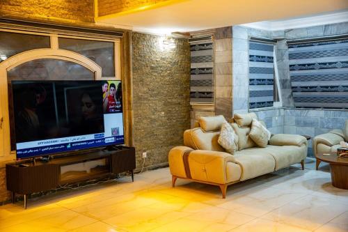 Televisyen dan/atau pusat hiburan di Malik Dijlah Hotel