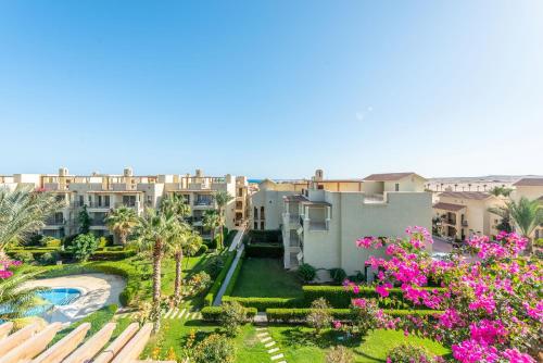 an aerial view of the gardens of a resort at VESTA - Sahl Hasheesh Residence in Hurghada