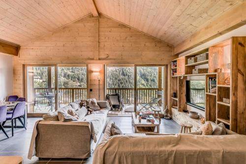 Istumisnurk majutusasutuses Résidence Les Nouveaux Alpages - Appartement 4 avec accès au SPA MAE-6664