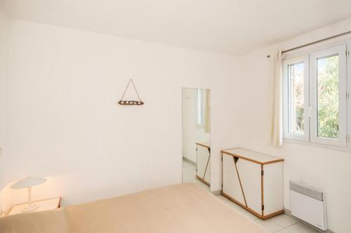 Postel nebo postele na pokoji v ubytování Résidence La Pinède - maeva Home - Appartement 2 Pièces 5 Personnes - Confort MAE-1032