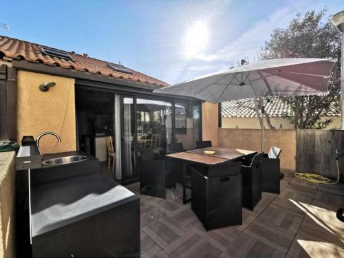 Photo de la galerie de l'établissement Résidence Village Merlin - Villa avec mezzanine pour 5 personnes - Port Leucate MAE-7804, à Leucate