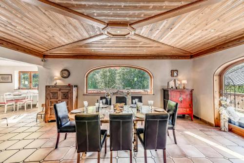 a dining room with a table and chairs at Chalet Alpaga - Chalets pour 12 Personnes MAE-7864 in Champagny-en-Vanoise