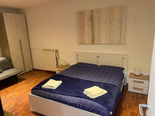 Ένα ή περισσότερα κρεβάτια σε δωμάτιο στο CasaTua 2