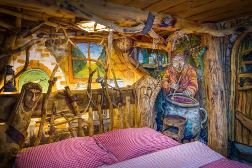 a room with a painting on the wall at Hotel Kocourkov in Hlinsko