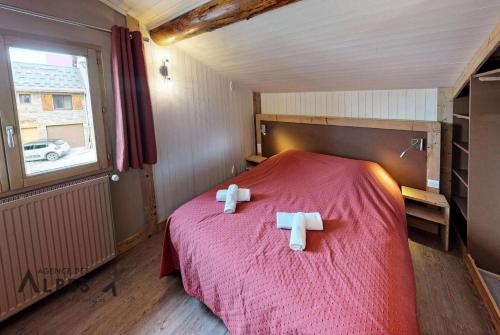Un pat sau paturi într-o cameră la Chalet De Manou - Pièces 694