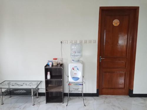 a room with a blender next to a door at AAA, Astungkara, Amazing Bromo Villa, Managed by Triple A Tour, Additional Bromo Jeep Tour and Airport Shuttle in Ngadisari