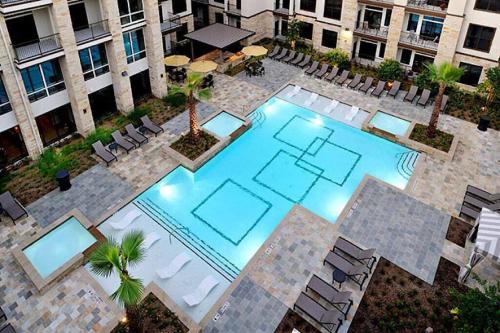 an overhead view of a swimming pool in a building at 2Bd/2Bth Hermann Park @ Med Ctr in Houston