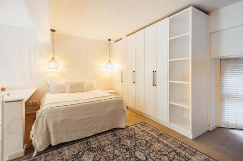 Postel nebo postele na pokoji v ubytování Drieks' Place