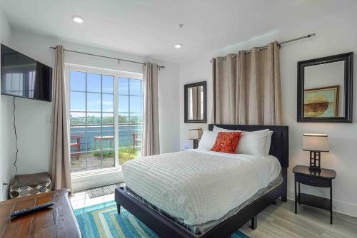 Ένα ή περισσότερα κρεβάτια σε δωμάτιο στο Luxury Penthouse , Private RoofDeck & Amazing View