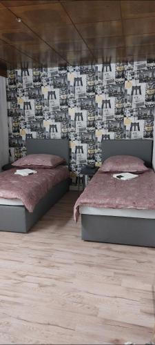 Un pat sau paturi într-o cameră la Mario Ferienwohnung