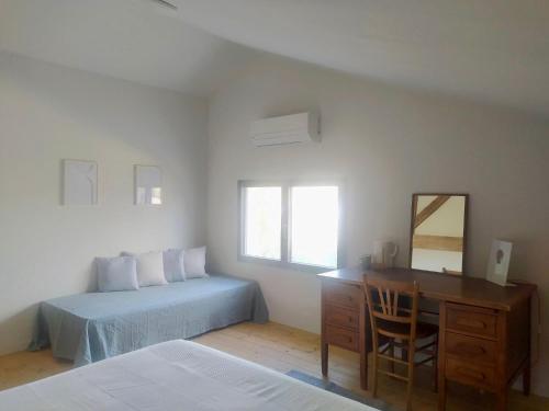 Ένα ή περισσότερα κρεβάτια σε δωμάτιο στο Chambre d'hotes du grand st-Marc proche Via Rhona