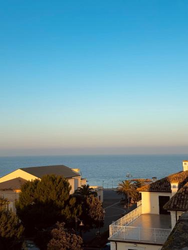 a view of the ocean from a building at Palazzo Lucangeli in Porto Recanati