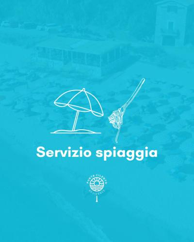 an umbrella and a bird on the water at Residence Punta Cilento in Pisciotta