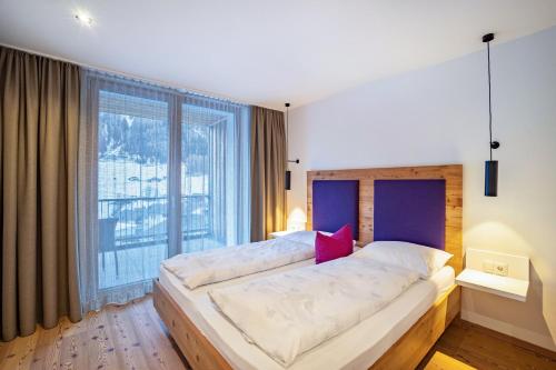 Ένα ή περισσότερα κρεβάτια σε δωμάτιο στο Stoana Apt 2-5