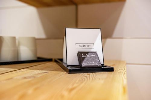 a box sitting on top of a wooden table at Stoana Apt 2-6 in San Giacomo