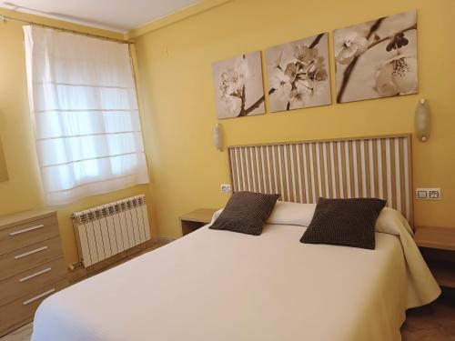 Postel nebo postele na pokoji v ubytování Apartamentos Querol
