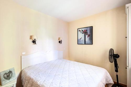 En eller flere senge i et værelse på Village Pont Royal en Provence - maeva Home - Appartement 2 pièces 4 person 184