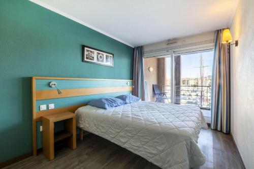 Postel nebo postele na pokoji v ubytování Résidence Cap Hermes - maeva Home - Appartement 2 pièces 6 personnes - Sélection MAE-7784